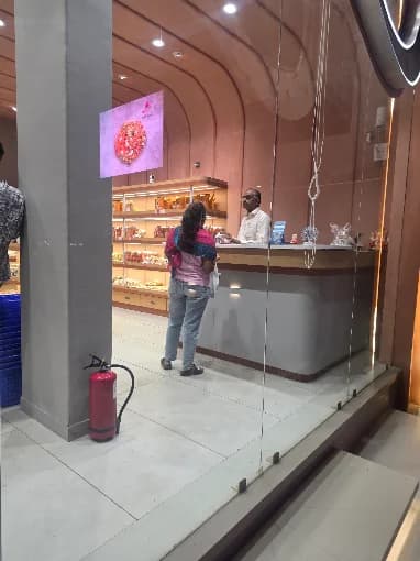 A customer being served at the counter